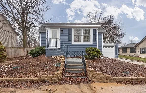 Front of a house in Peoria that we bought fast